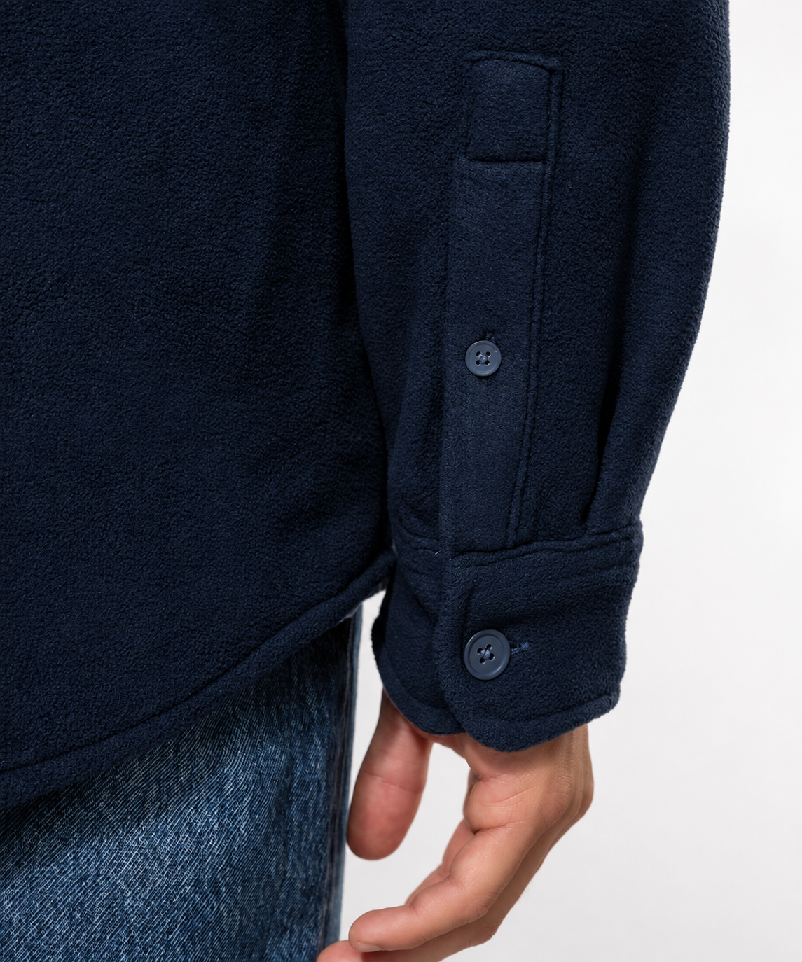 The Fleece Overshirt in Navy, cuff close-up