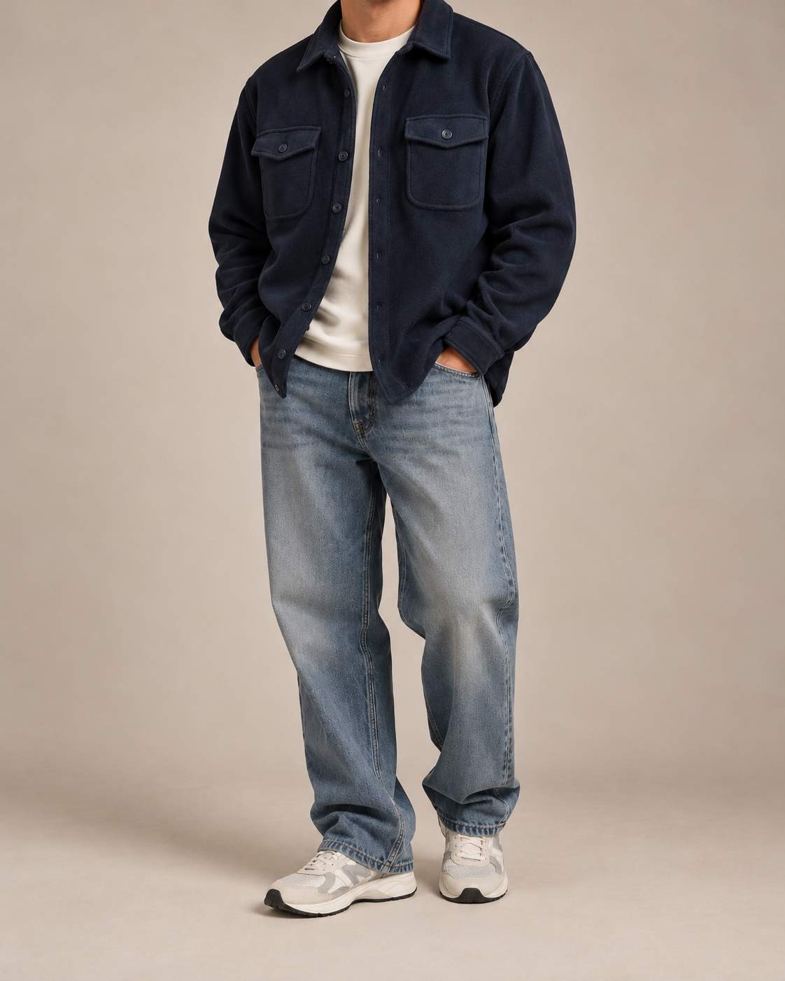 The Fleece Overshirt in Navy, worn open over a white tee