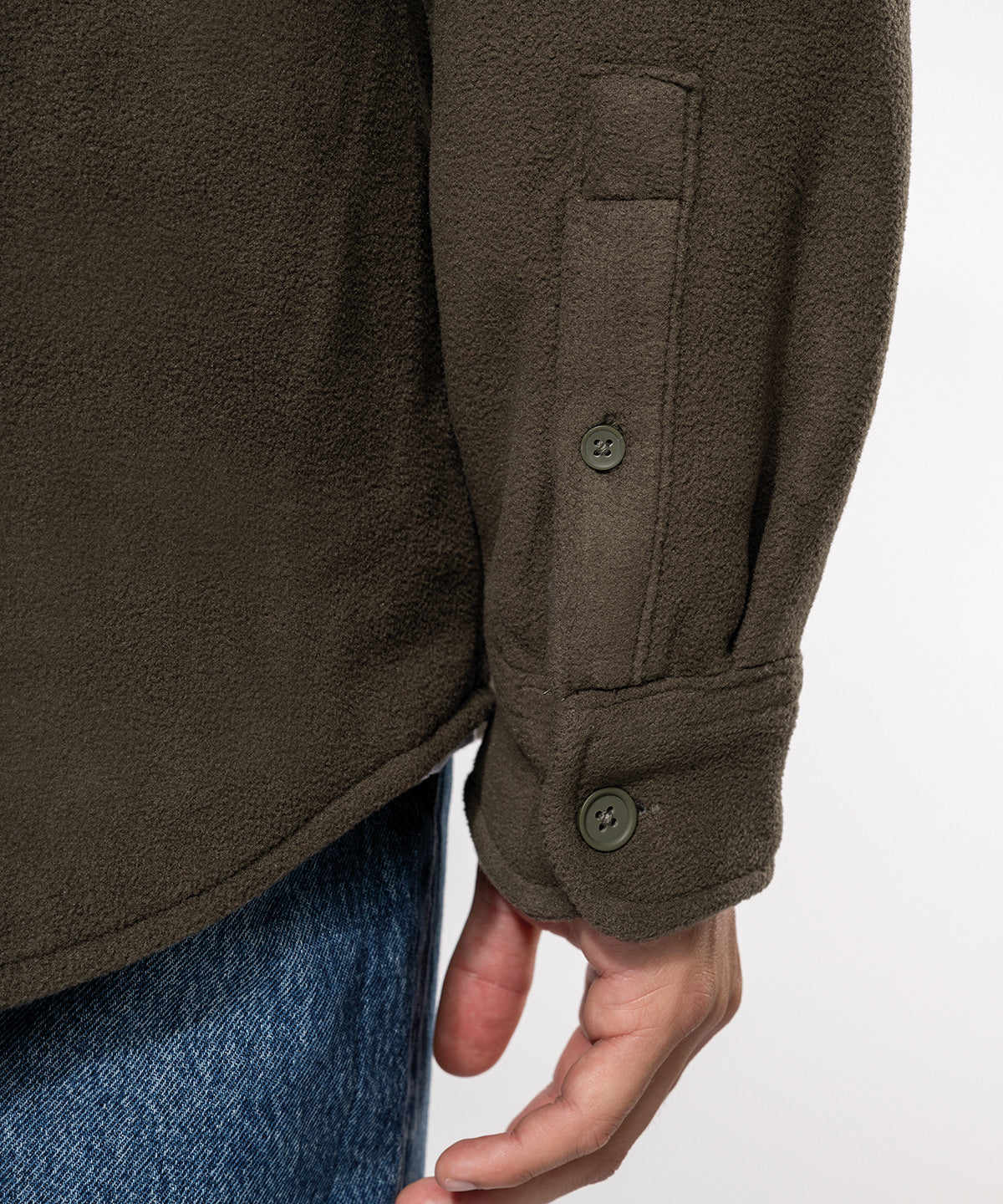 The Fleece Overshirt in Olive, cuff close-up