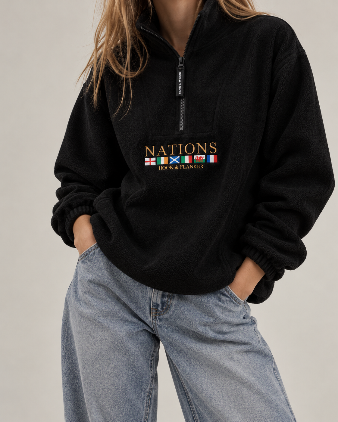 The Nations Fleece in Black, worn with light denim