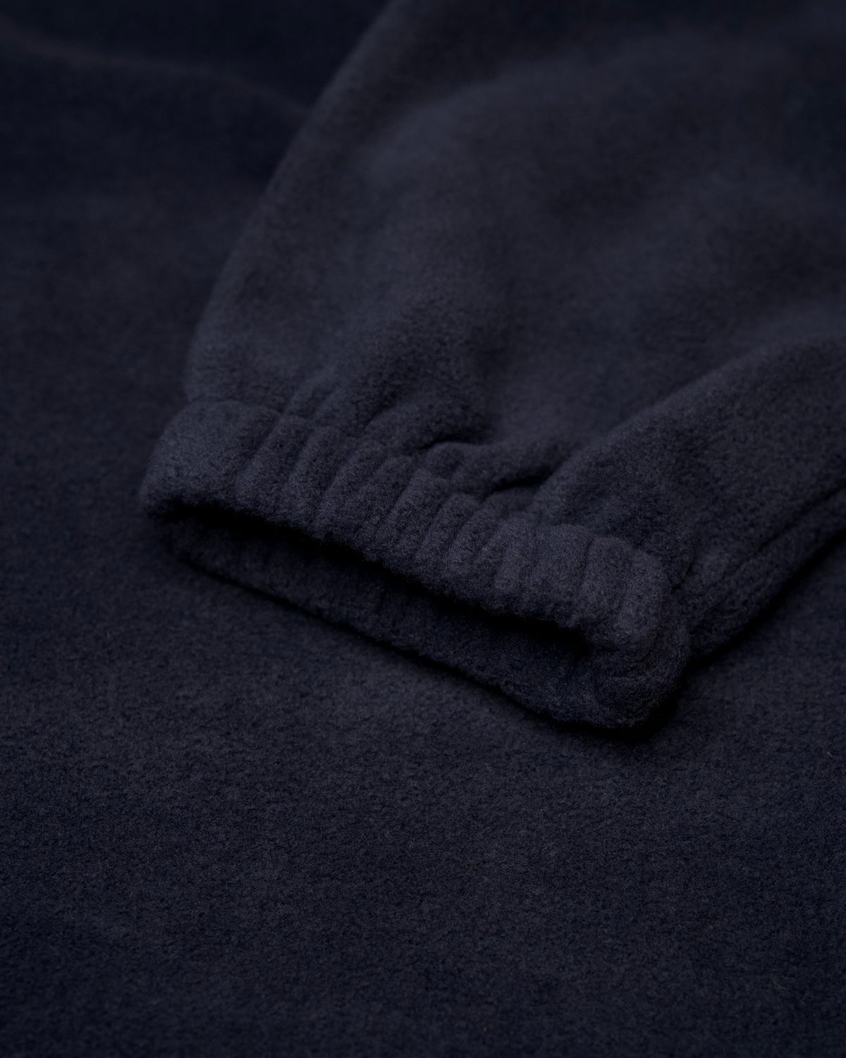 The Nations Fleece in French Navy, elasticated cuff detail