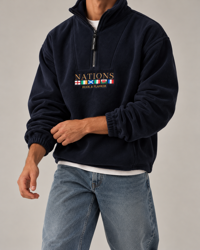 The Nations Fleece in French Navy, worn with mid-wash jeans